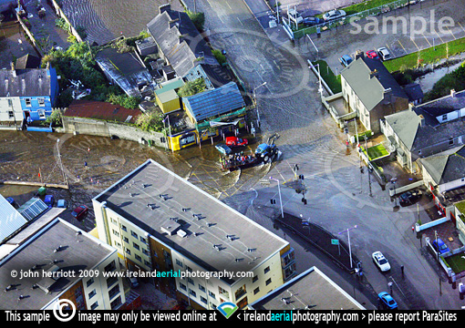 tractor flood transporting people