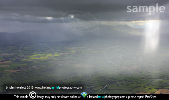 Heavens Above, rain over Cashel and Galty Mountains