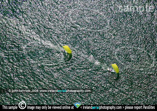 Yacht race, yellow spinakers